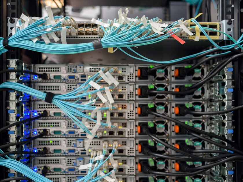 Working servers, switches or routers in data center with a lot of led lamps and cables